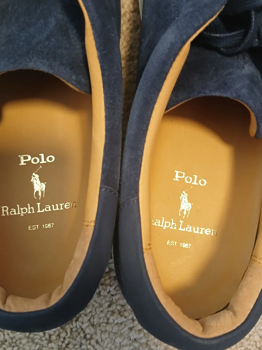 Polo Ralph Lauren Jermain sneakers feature a streamlined silhouette in navy blue